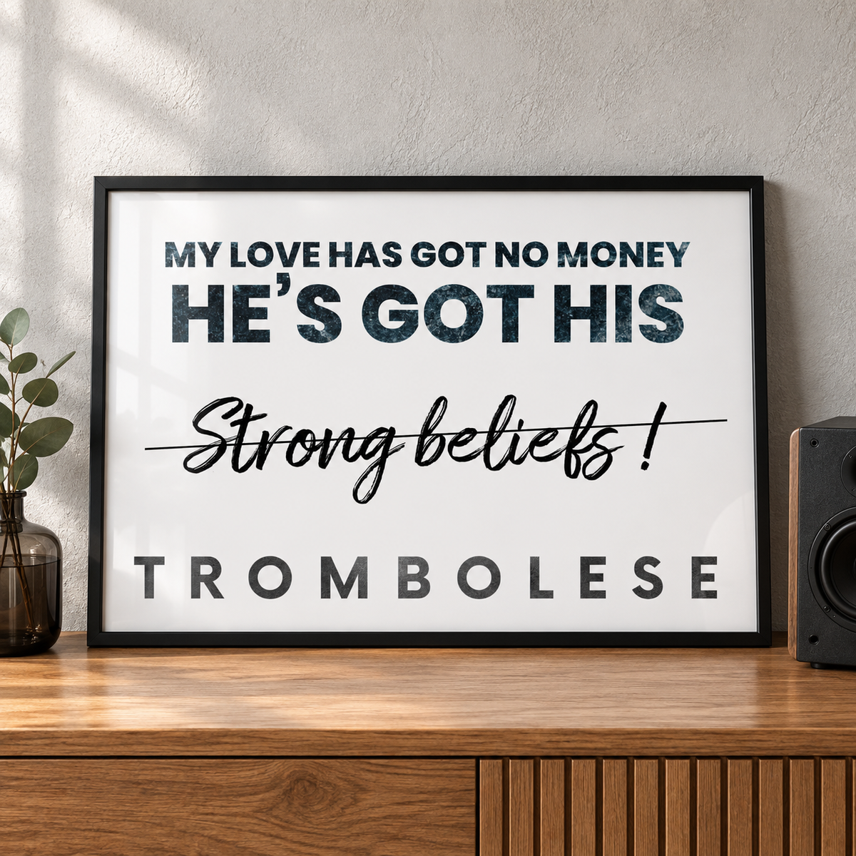 Freed From Desire Strong Beliefs landscape lyric print in a black frame