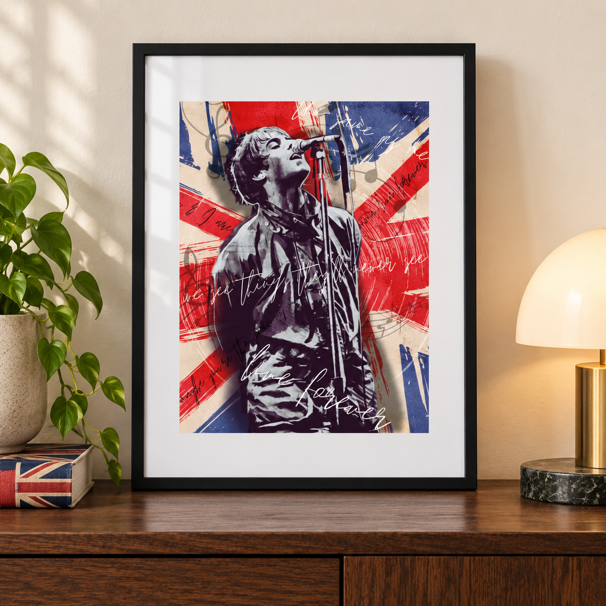 Oasis Live Forever Liam Union Jack print in a black frame on a sideboard