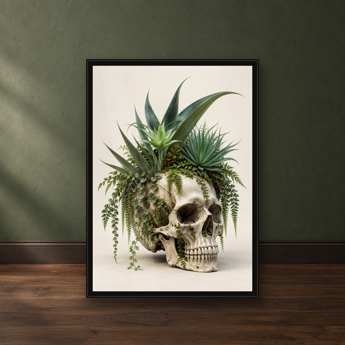 Agave Crown Skull Print in a close-up black frame leaning against a green wall
