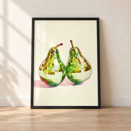 Disco Ball Pears print in a glossy black frame leaning against a wall