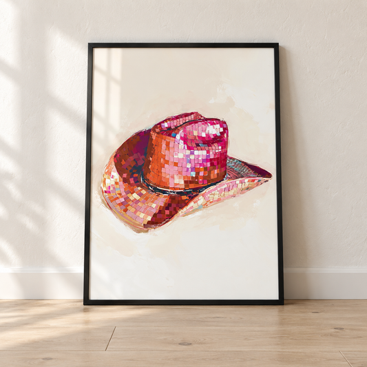Disco Cowgirl Hat print in a glossy black frame leaning against a wall