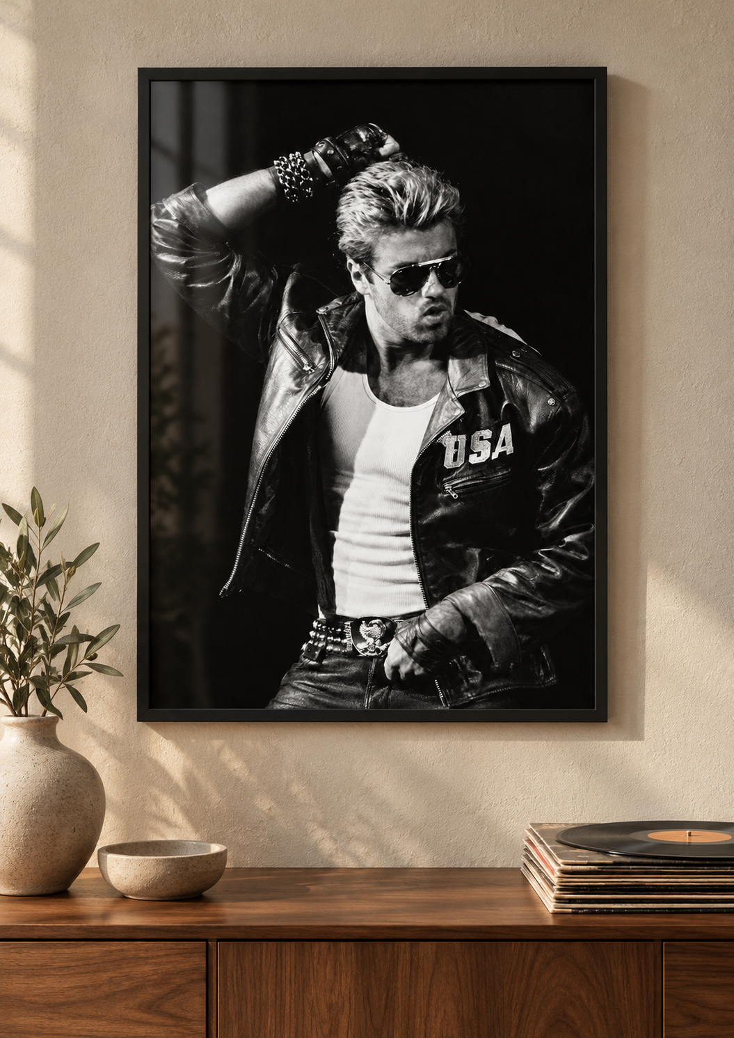 Included George Leather & Shades print shown in a black frame; frame not included