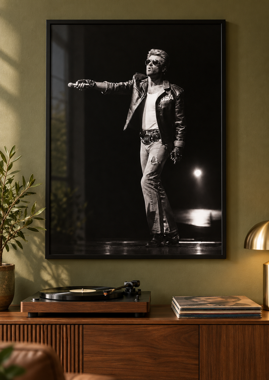 Included George Take the Mic print shown in a black frame; frame not included