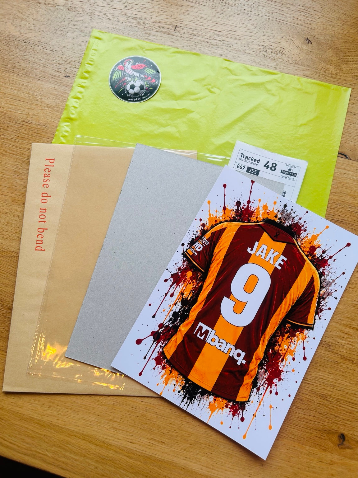 A4 print with backing board, cello wallet, board-backed envelope and outer postal bag