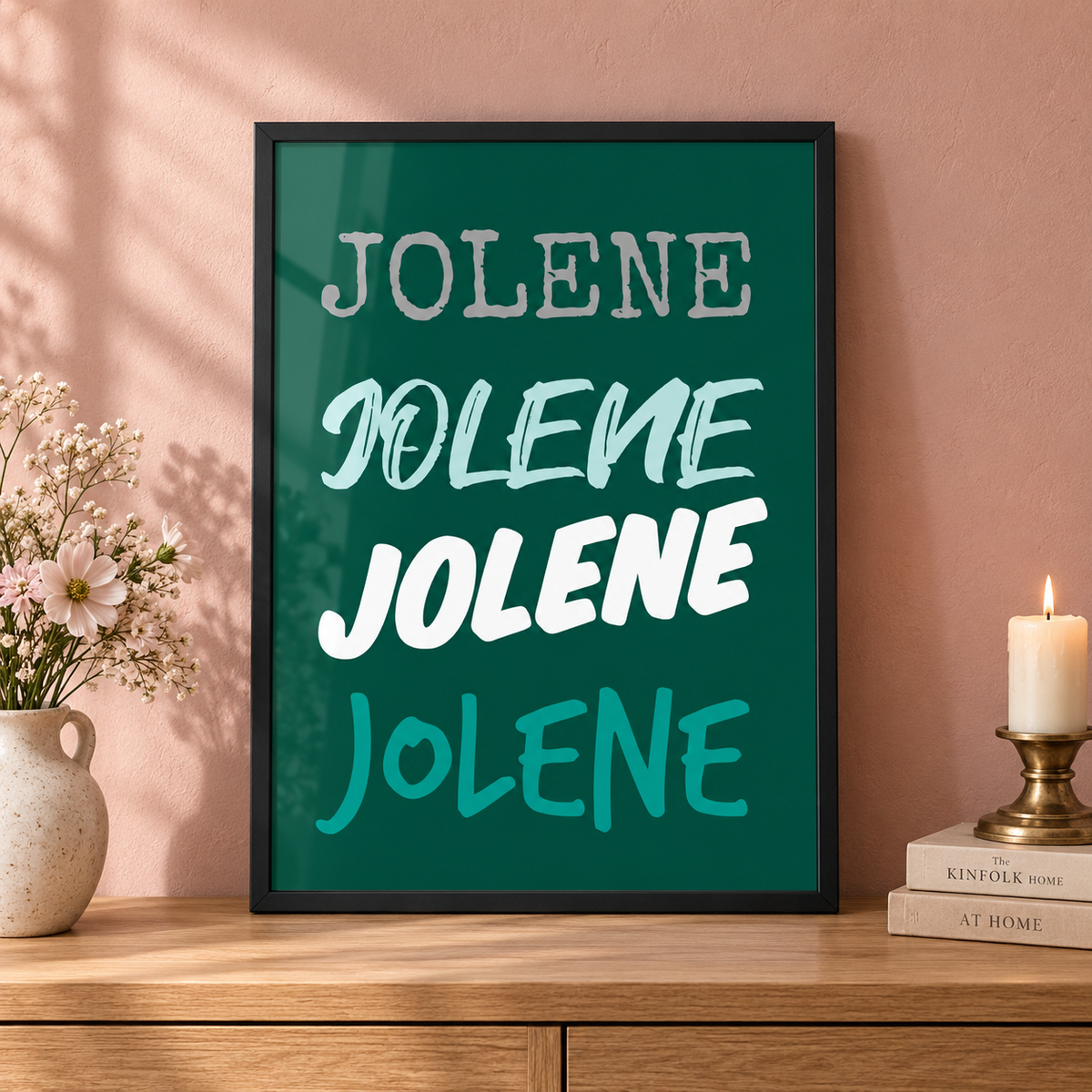 Jolene Dolly Parton lyric print in a black frame on an oak console