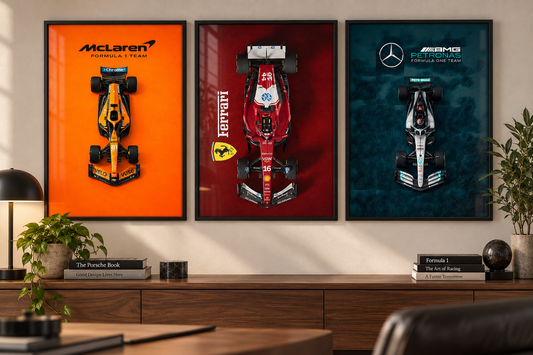 McLaren, Ferrari and Mercedes motorsport prints displayed together in black frames. Set of three prints supplied unframed.