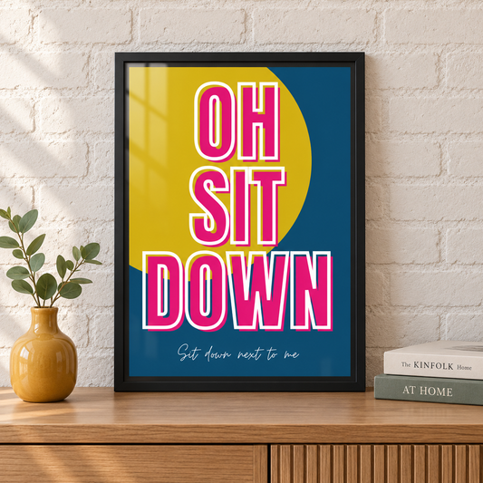 Oh Sit Down James music print in a black frame against a pale brick wall