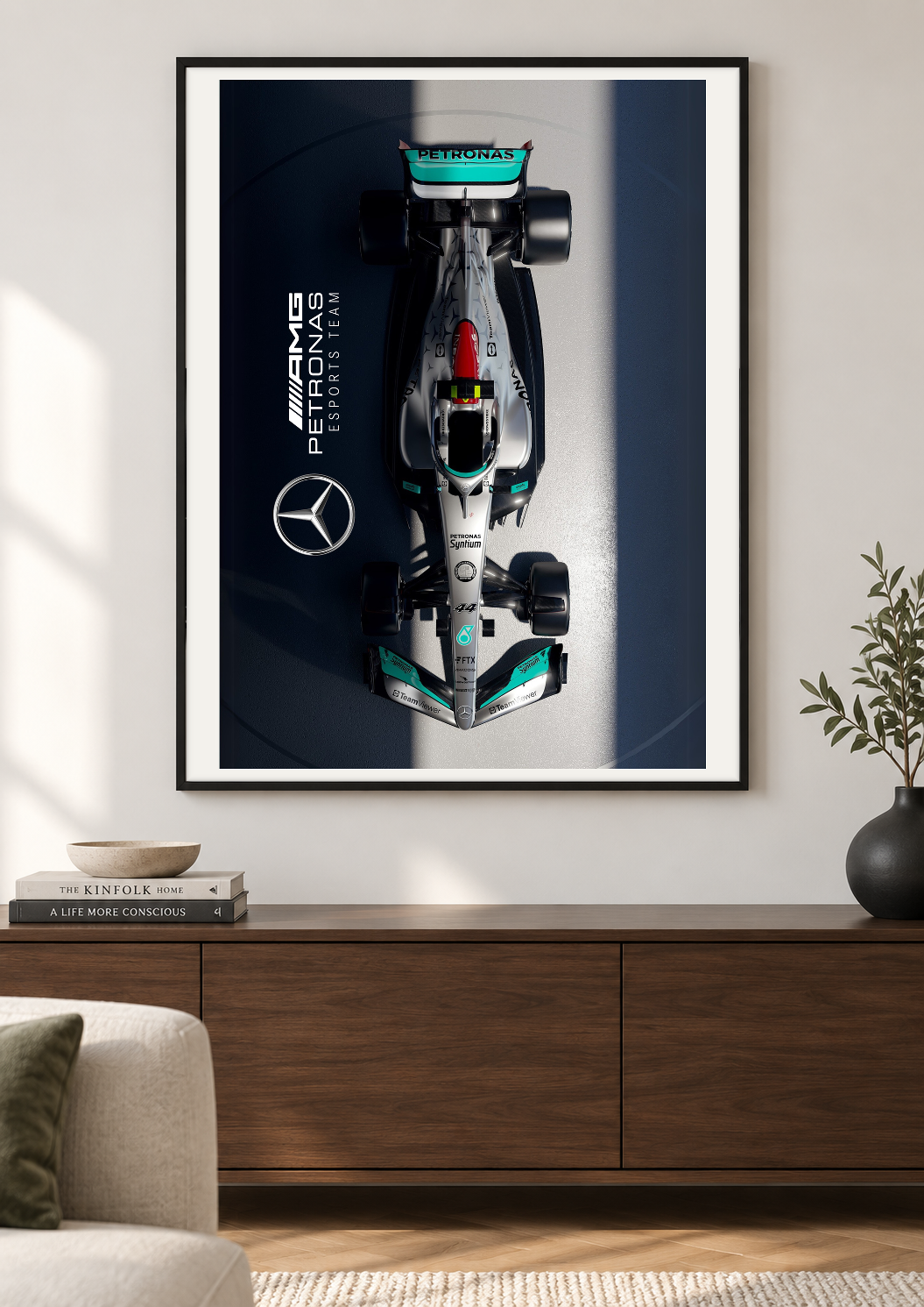 Petronas Motorsport Print using the complete original artwork inside a black frame in a sitting room. Print supplied unframed.