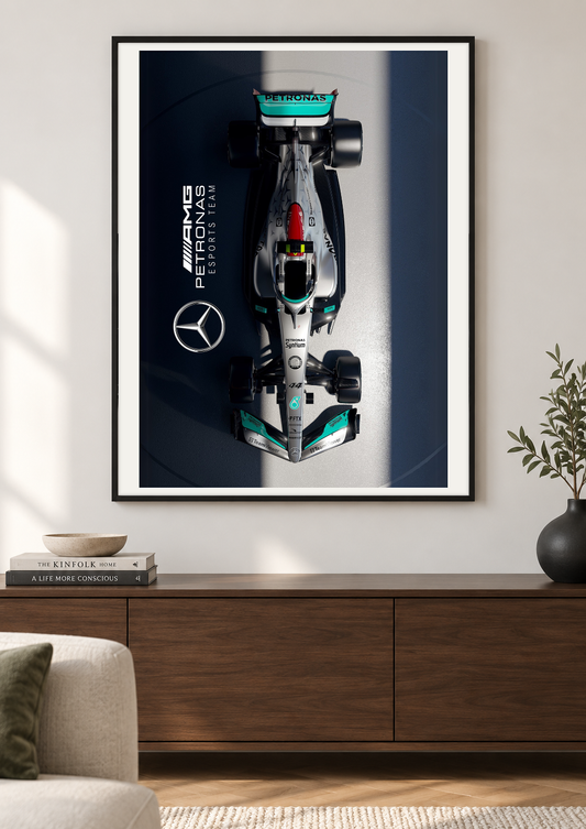 Petronas Motorsport Print using the complete original artwork inside a black frame in a sitting room. Print supplied unframed.