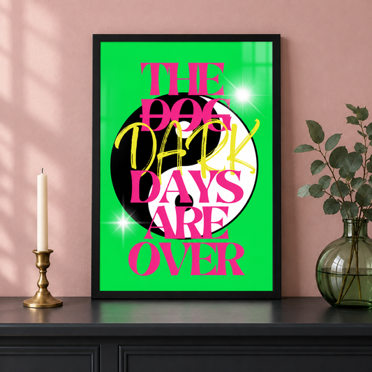 The Dark Days Are Over music print in a black frame on a dark console