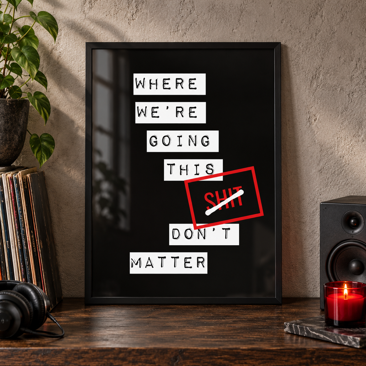 Where We're Going Gerry Cinnamon lyric print in a black frame on a dark oak console