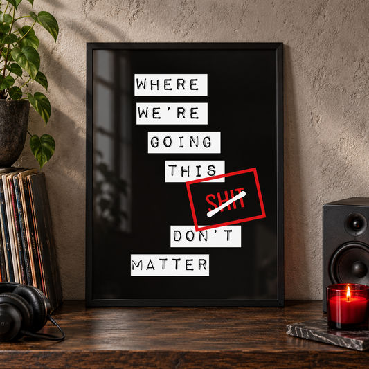 Where We're Going Gerry Cinnamon lyric print in a black frame on a dark oak console